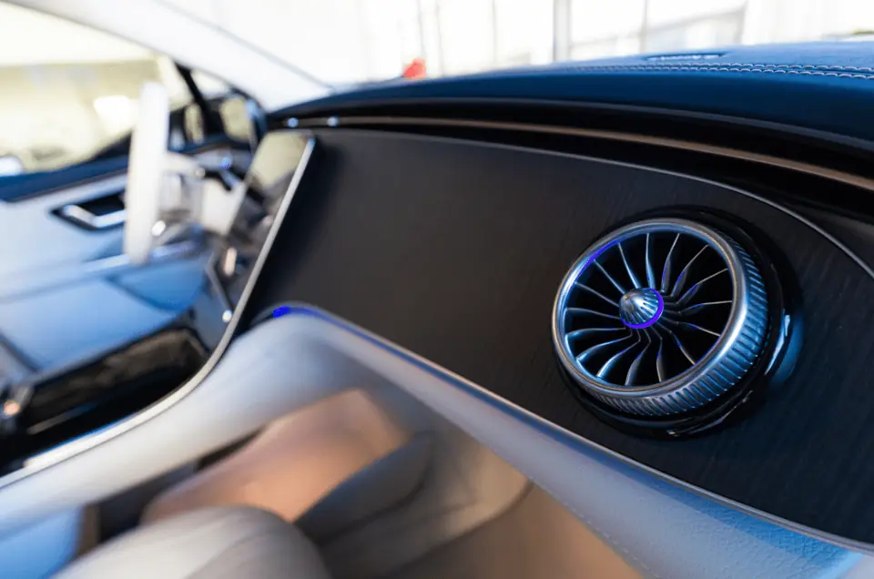 Illuminated air vent and dashboard inside a Mercedes EQS