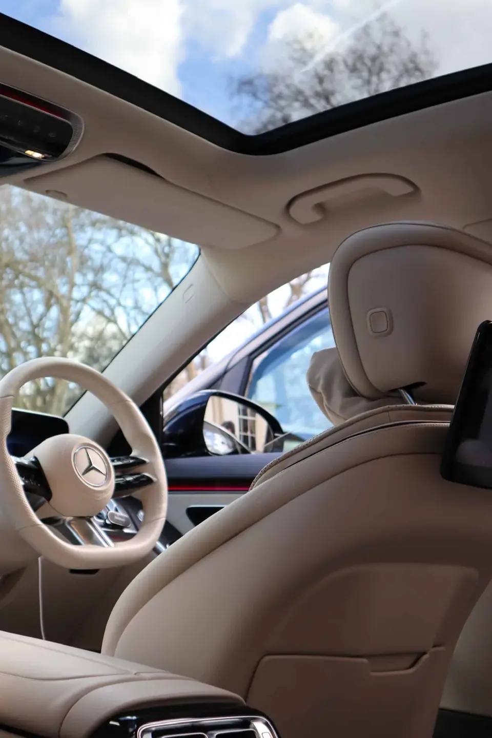 Rear cabin of a Mercedes EQS with panoramic glass roof